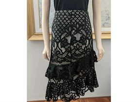 Black lace midi skirt. symmetrical hem. Sz 12. Exc cond